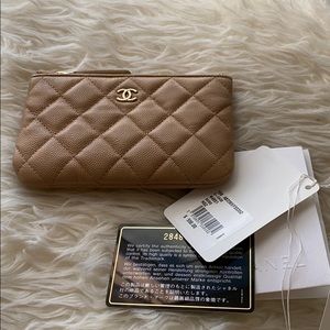 Chanel card holder in beige.
